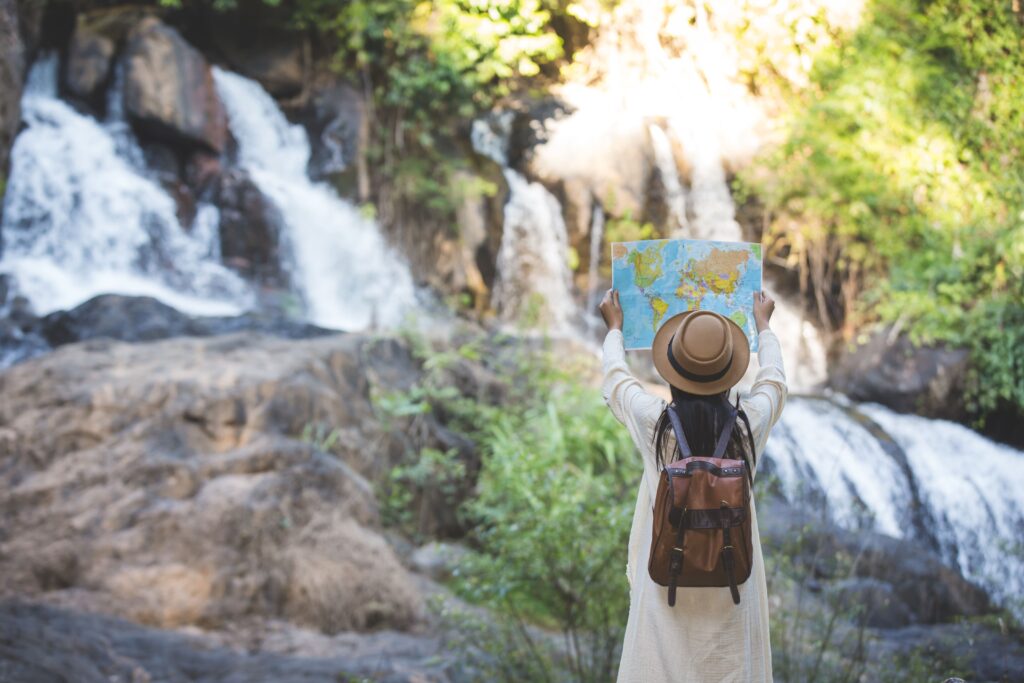 female-tourists-hand-have-happy-travel-map