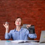 20-Minute Morning Workout: The Simple Routine That Can Transform Your Day Person calculating savings and investments at a desk