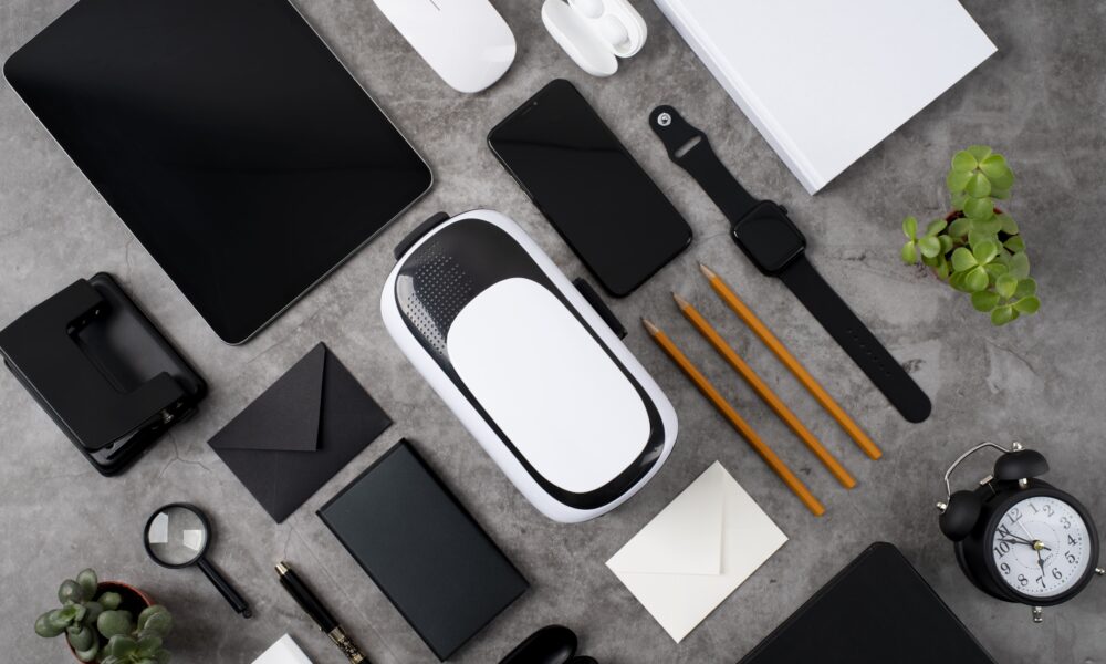 Top 7 Smart Gadgets That Make Life Easier A collection of modern smart gadgets on a desk