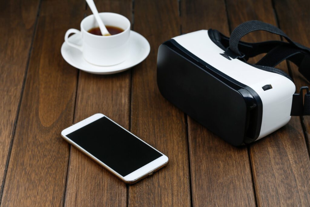 vr-glasses-cell-phone-wooden-desk