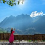 10 Simple Lifestyle Changes for a Happier and Healthier 2025 Traveler enjoying a scenic budget-friendly destination in 2025