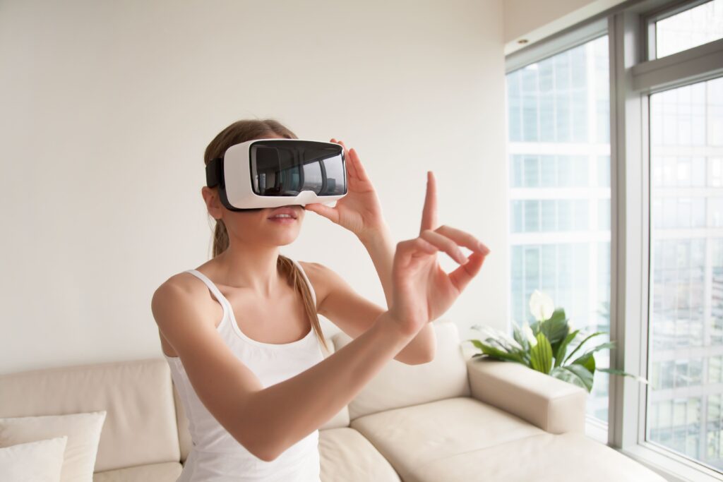 woman-vr-headset-touching-virtual-objects