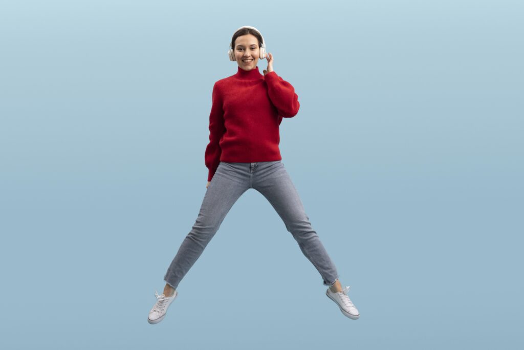cute-woman-jumping-isolated-blue