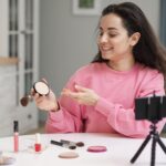 Flatlay of skincare, makeup and accessories for modern beauty routine 2025